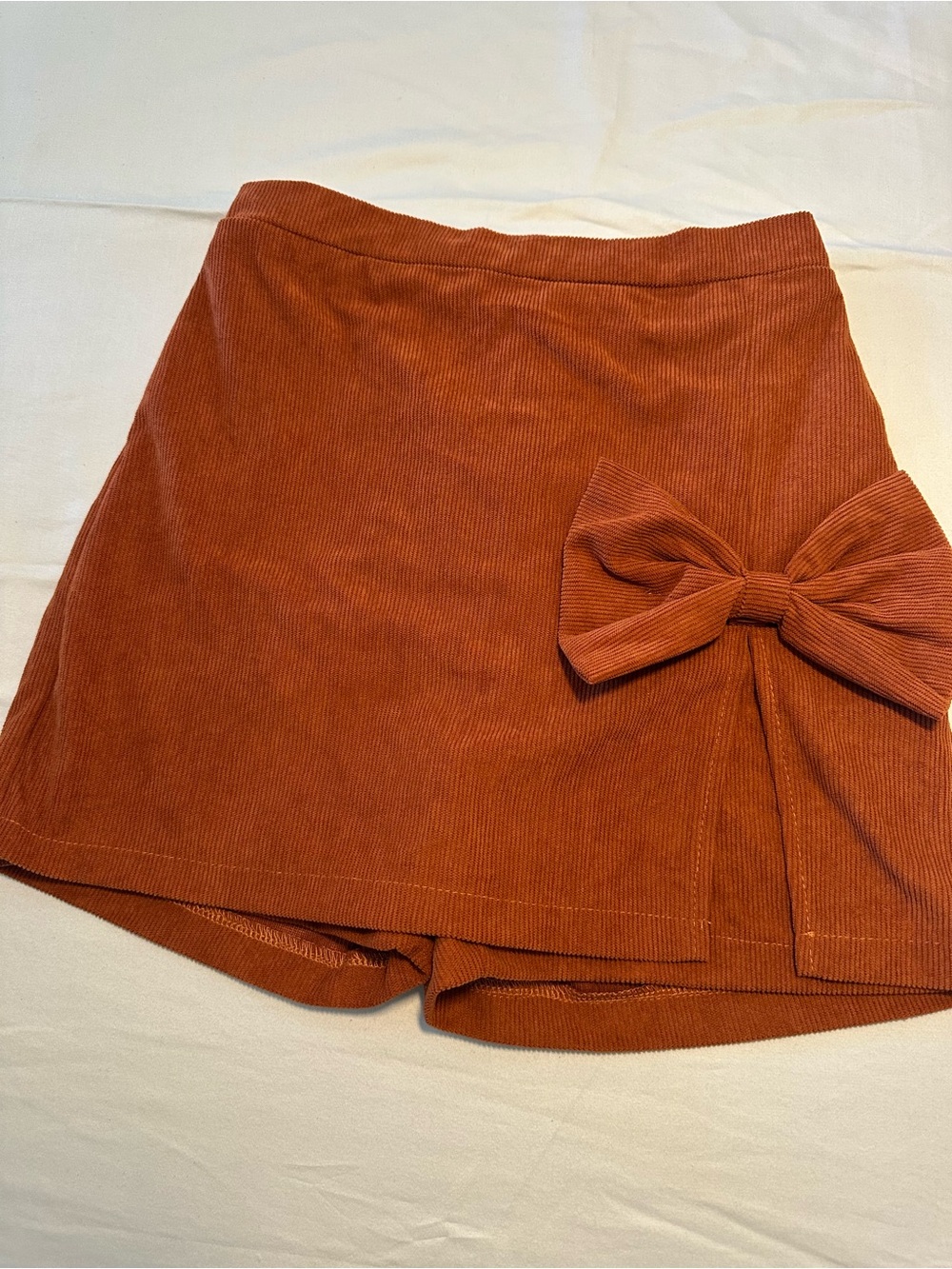 Corduroy Bow-Accent Mini Skirt in Rust